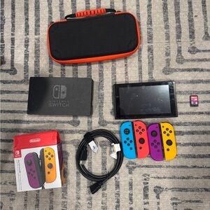 Nintendo Switch with Multicolor Joy-Con Controllers